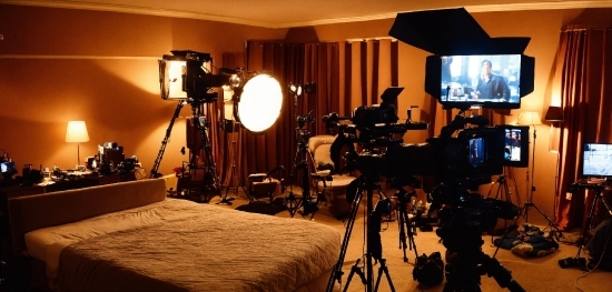 Tripod, Videographer, Interior Design, Cameras & Optics, Lamp, Cinematographer