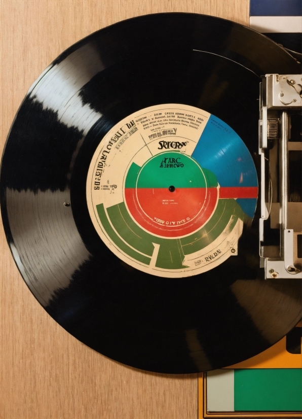 Gramophone Record, Circle, Publication, Font, Composite Material, Recreation