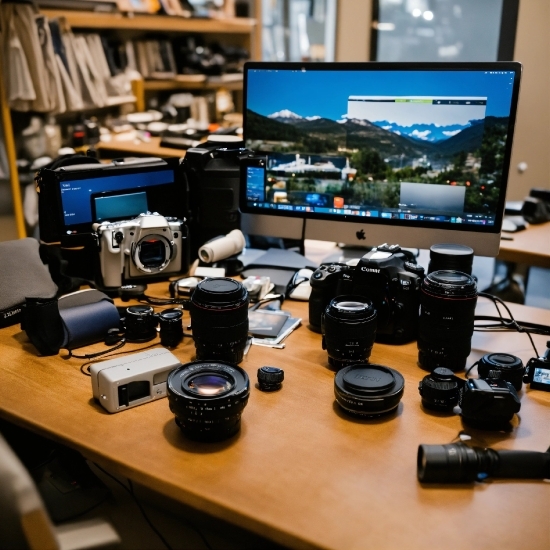 Table, Computer, Product, Camera Lens, Camera Accessory, Reflex Camera